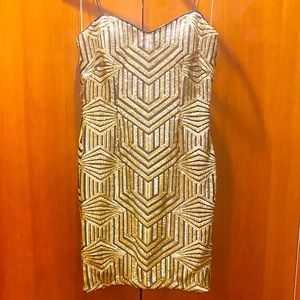 Aiden Golden black sequin dress something Cleopatra would wear